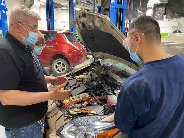 An Electric Car Mechanic